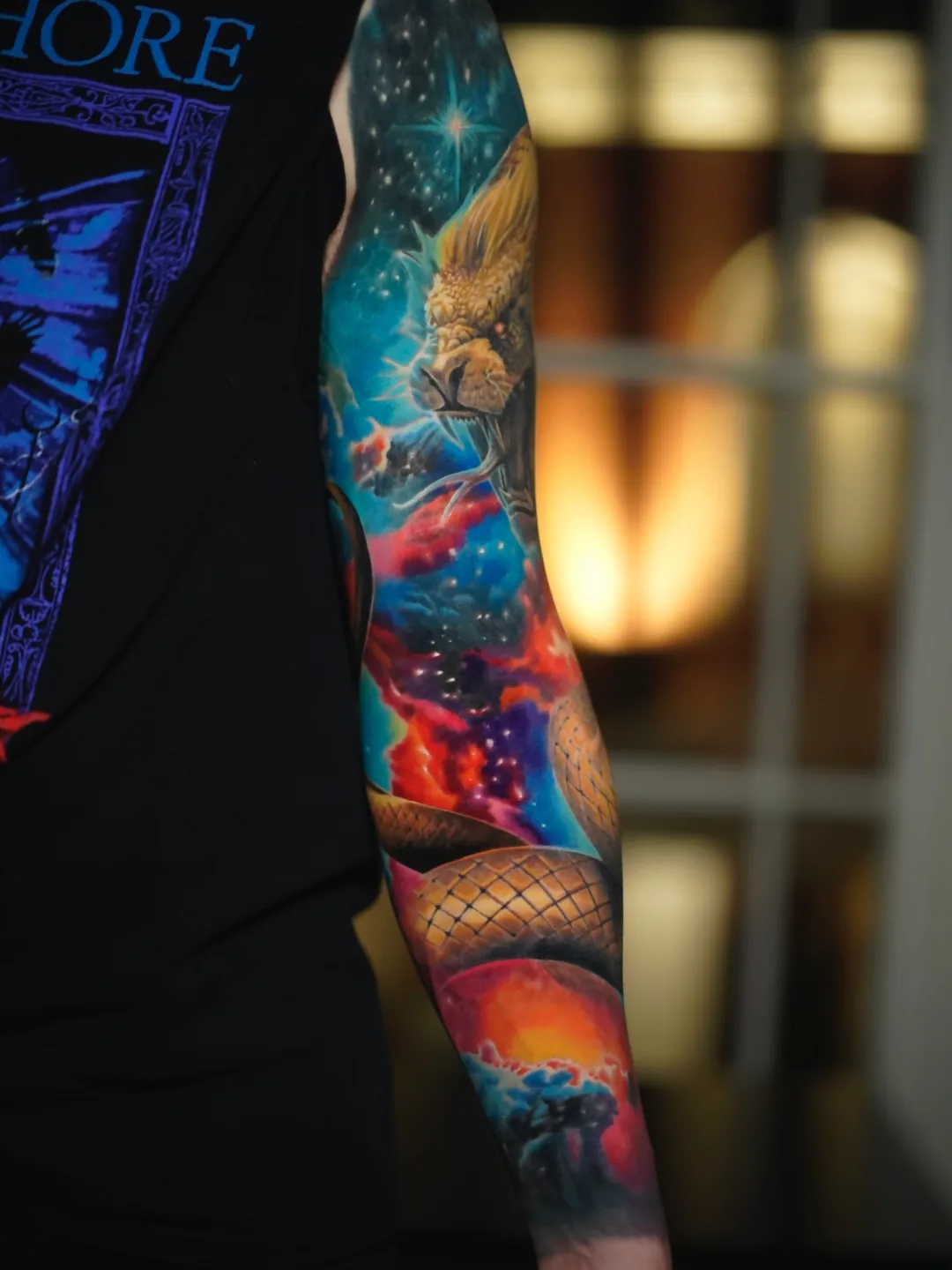 Chnoubis full sleeve tattoo by Churchill